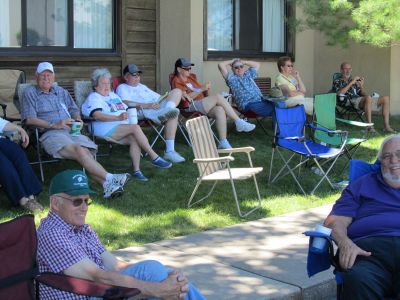 Lawn chairs, shade, a brew  and beautiful cars
