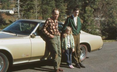 1966 GS with Headrests and Red Line Tires
Little girl seems to be only one happy to be standing beside a Riviera
