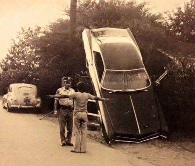 Honest Officer - I wasn't drinking
1967 - Anyone's guess how this happened. Would have been an interesting dismount for the driver.
