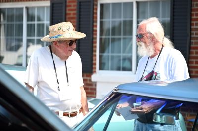 More long-time members Jerry and Randall catching up on Show Day …
Randall organizes the Parking for the ROA on Show Day
