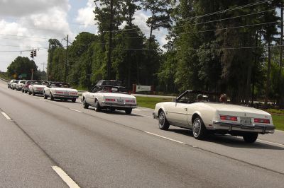 A line of Very Nice Rivieras
on the way to our Show location
